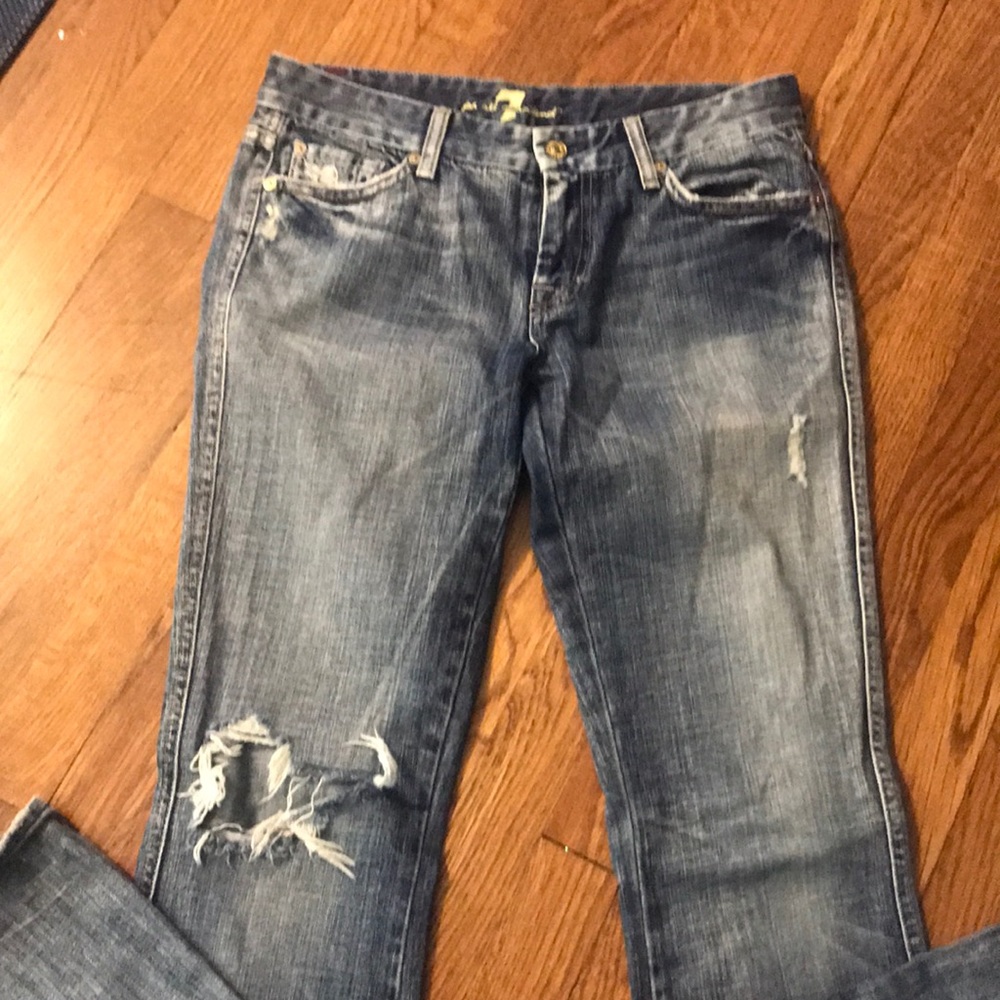 One pair of denim ripped flare jeans!